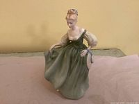 Front view of Royal Doulton Fair Lady figurine