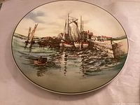 Front of Royal Doulton plate showing nautical scene