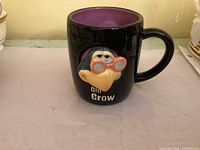 Front view showing crow relief and Old Crow text