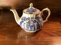 Side view of Sadler Blue Willow teapot with lid
