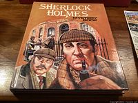 Front cover showing title and illustration of Sherlock Holmes characters