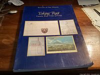 Front cover of blue hardcover book Taking Root