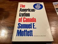 Front dust jacket showing title, author, promotional bubble