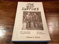 Front cover showing title, photo of two men, author name