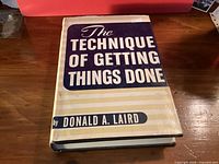 Front view showing full dust jacket cover with title and author.