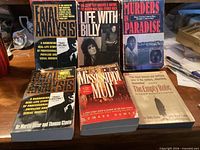 Front covers of six true crime paperbacks