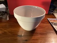 Front/side view of white pudding basin on table