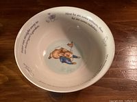 Top view showing interior Peter Rabbit illustration and rim text