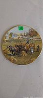 Front view of decorative porcelain plate with harvest scene