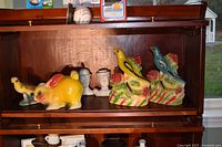 Shelf with all six chalkware pieces displayed