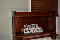 Stacked 1979 Topps football cards inside cabinet