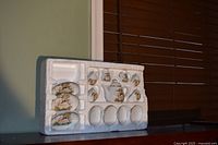Full styrofoam tray showing entire tea set
