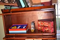 All three boxed scent and bath sets on shelf