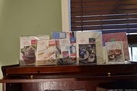 All five sealed Creative Woman kits displayed