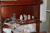 Shelf view showing glass cat figurine, ceramic teapot, sugar bowl, creamer and cat print tote