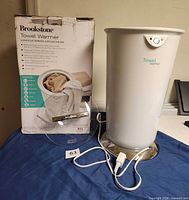 Towel warmer with lid, power cord and original box