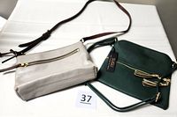 Both crossbody purses side by side showing overall appearance