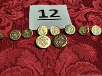 All buttons front view with size reference card