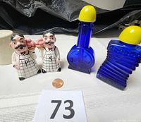 All four shakers with penny for scale and lot number