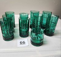 Group view of all ten emerald green windowpane glasses