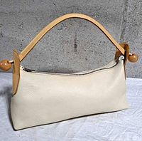 Full view front of beige leather Furla bag