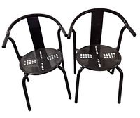 Front view of both black metal IKEA Maxmo chairs