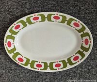 Front view of oval platter showing geometric rim pattern