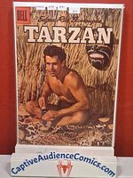 Front cover of Tarzan #89 comic in protective sleeve on stand