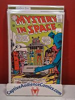 Front view of bagged Mystery in Space #102 showing full cover art and grade sticker