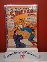 Front view of bagged Superman #172 comic on display stand