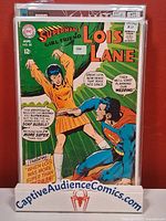 Front view of Superman's Girlfriend Lois Lane #85 comic in bag and board on display stand