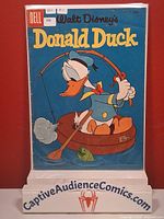 Front cover of Donald Duck #47 comic in bag and board