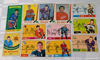 Front view of twelve 1960s NHL hockey cards