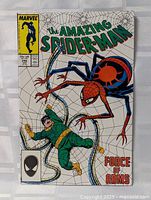Front cover showing title, Spider-Man, Doctor Octopus and large spider graphic