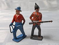 Cowboy and soldier figures front view