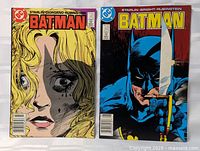 Front covers of Batman #421 and #422