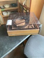 Full view of Dual 1216 turntable with dust cover closed
