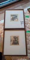Both framed etchings together showing overall size and framing
