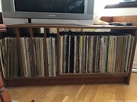 Full view of two shelf sections filled with LP records