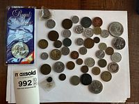 Overall view of all coins and packaged crown