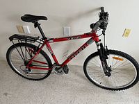 Full side view of Trek 4300 bicycle showing frame, wheels, and rear rack