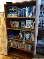 front view loaded with books showing size and shelf arrangement