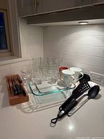 overall lot view: knife block, bakeware, utensils, mugs, assorted glasses