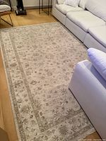 Full view of rug in living room showing pattern and size