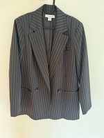 Full view of grey pinstripe blazer