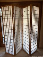 Full view of the four-panel shoji screen partially folded