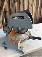 Left side view of Delta miter saw on table