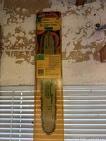 Front view of sealed Oregon 16-inch bar and chain combo package