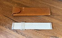 Slide rule and leather case overview
