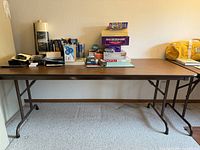 Overall view of folding table showing top and legs